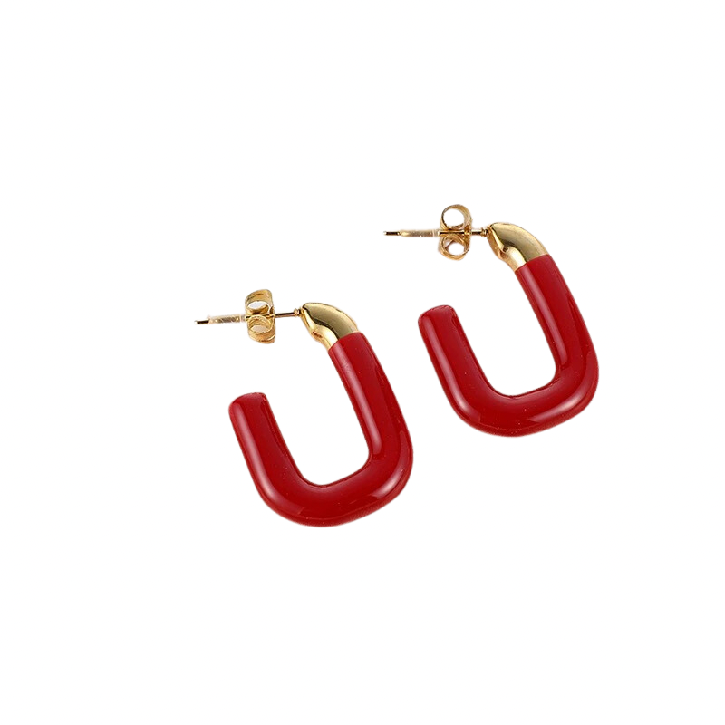 Boucles Tania audacieuses en acier inoxydable plaqué 18k, rouge éclatant et doré. Design moderne en forme de U pour un style élégant et brillant.